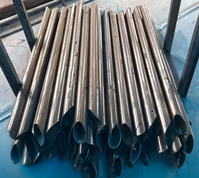 Multiple steel pipes prepared for coffee table frames, showcasing DELTA CAINA's high-quality materials and manufacturing expertise in furniture hardware production.